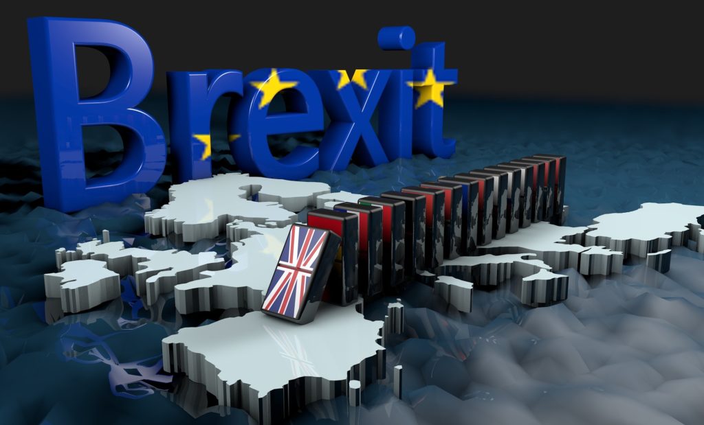 Brexit sign and Union Jack dominoes set to fall