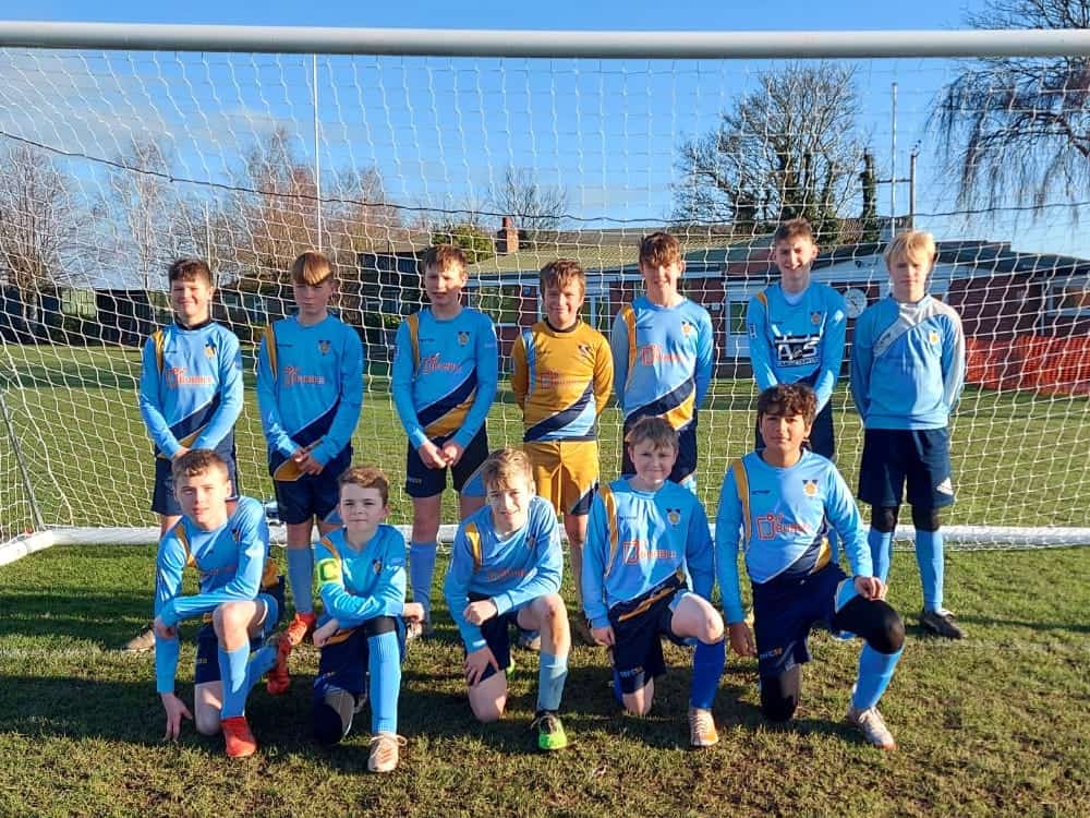 Gillway FC Under-13s football team lined up in goal