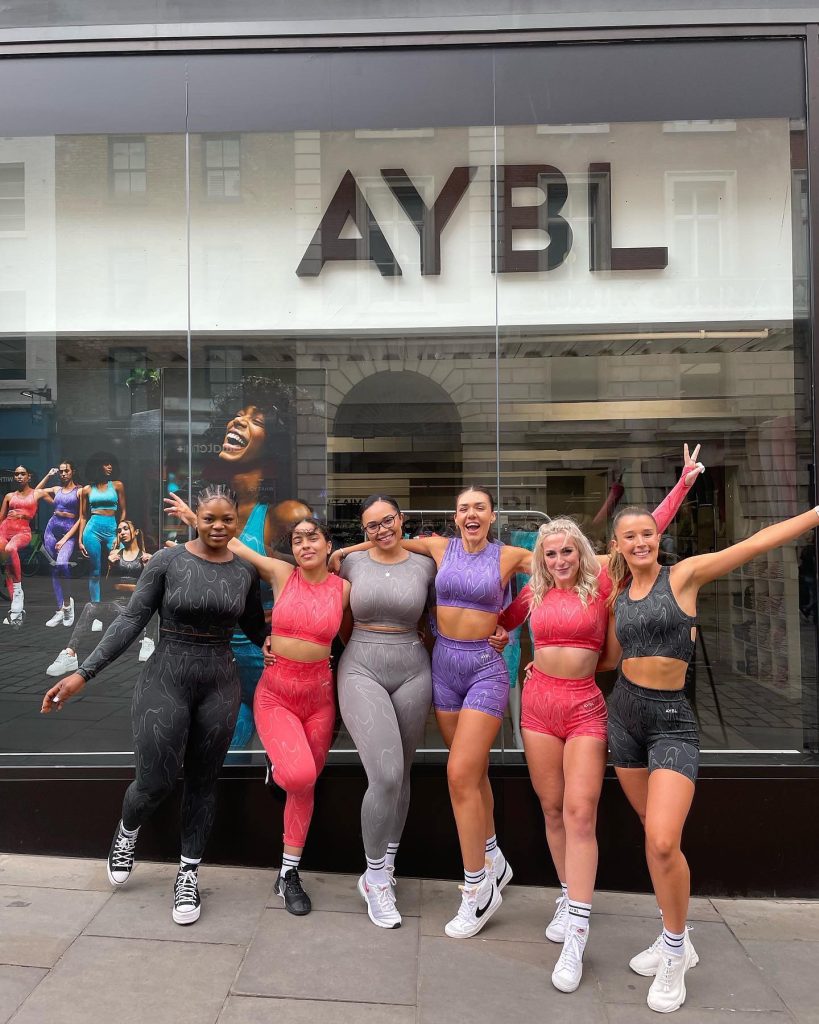 AYBL models in full kit in front of London store