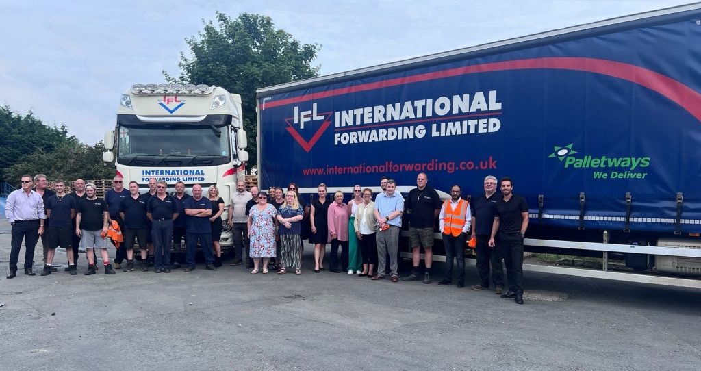 Team IFL standing in front of IFL truck